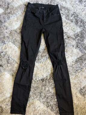 American Eagle Next Level Stretch Jegging Size 2 Regular Black Ripped Jeans